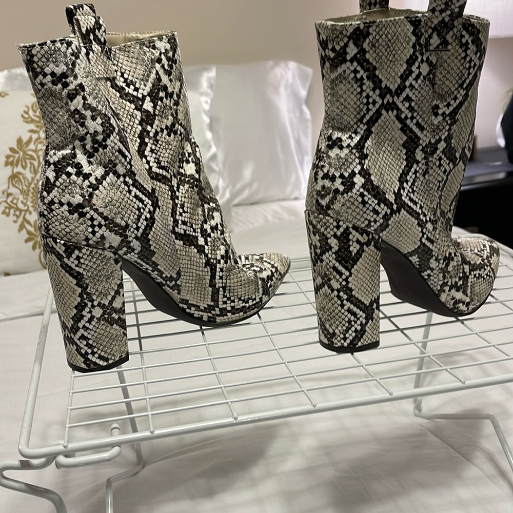 Faux leather rattle snake bootys super comfy just like new only wore two times.